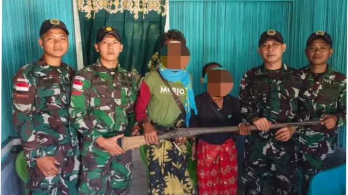 Yonarmed 12 Kostrad Terima Senjata Api dari Warga di Perbatasan